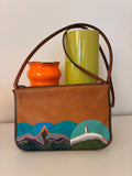 Pochette grainée à bordure festonnée